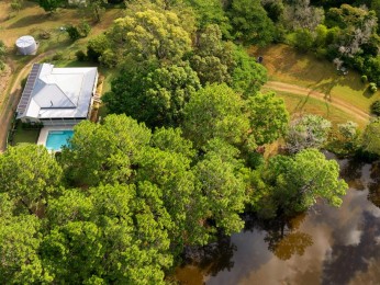 Private 10-Acre Queenslander with Expansive Usable Paddocks, Dam & Established Lifestyle Infrastructure