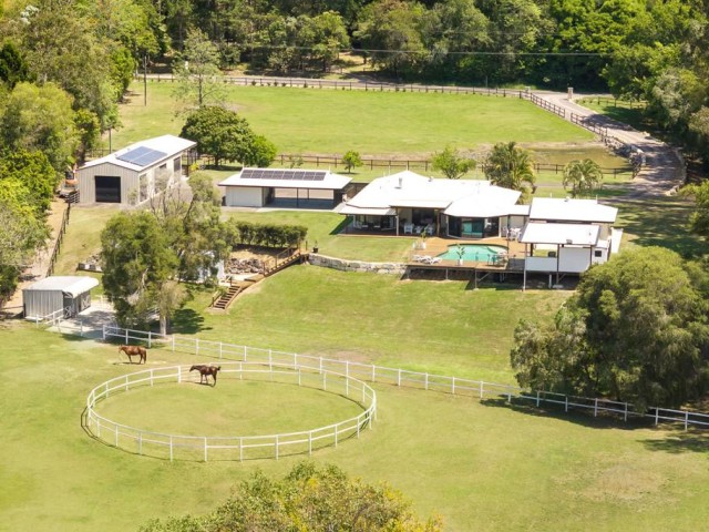 Riverfront Acreage Retreat